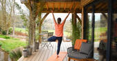 Do your morning yoga practice on the decking