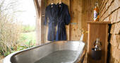outdoor bath tub with hot and cold water available