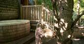 Hot tub on the deck at The Hideaway Treehouse, Pickwell Manor, Devon