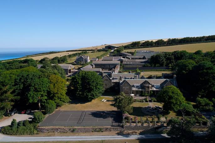 View of Pickwell Manor with the sea in the distance