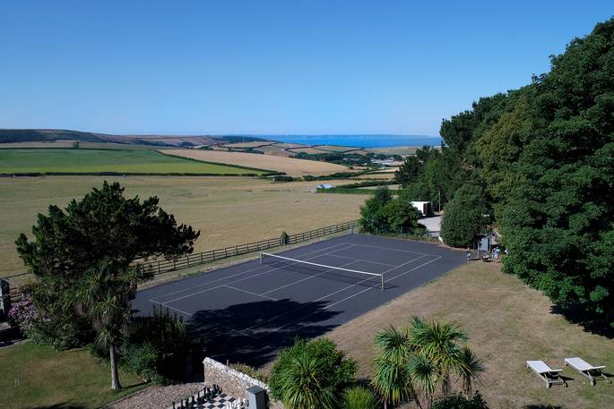 Tennis courts with a sea view at Pickwell Manor in Devon