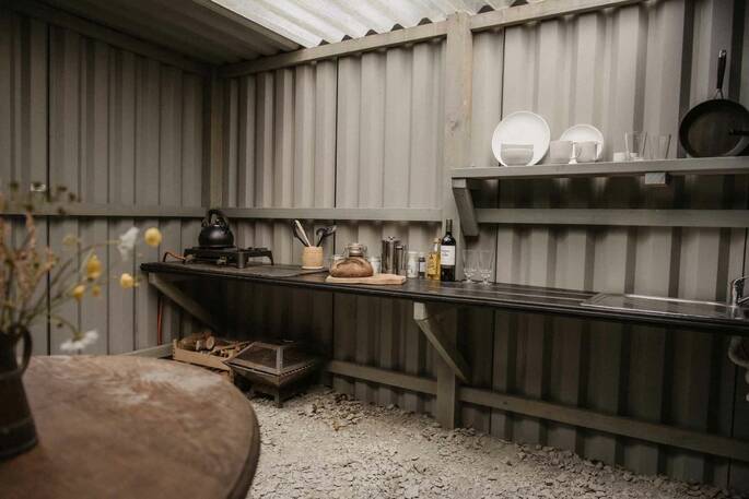 Each space has an outdoor camp kitchen