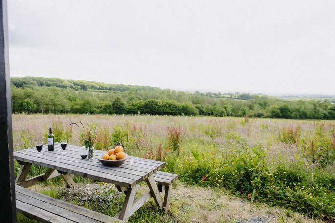 View from picnic bench outside hut
