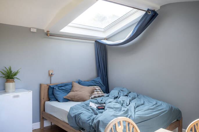 Bed under skylight