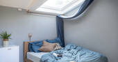 Bed under skylight