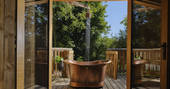 Hideout Treehouse view to copper hot tub from inside, Hartland, Devon