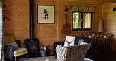 Stibb Hollow Cabin living room with wood burner, Torrington, Devon