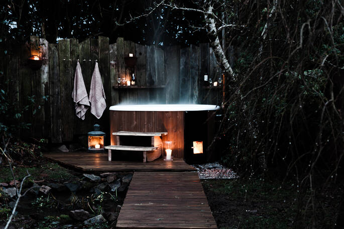 Relax and unwind in the amazing wood fired hot tub at The Brake in Devon