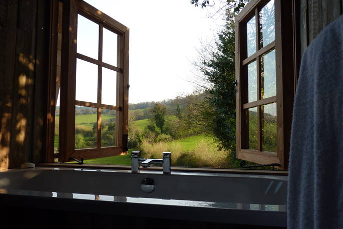 View from the bath tub at Orchard Wagon at The Wood Life in Devon
