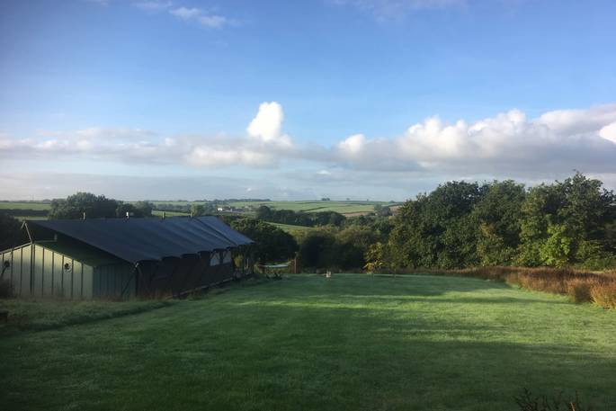 Endless space for picnics or family games at Taw safari tent, in Devon