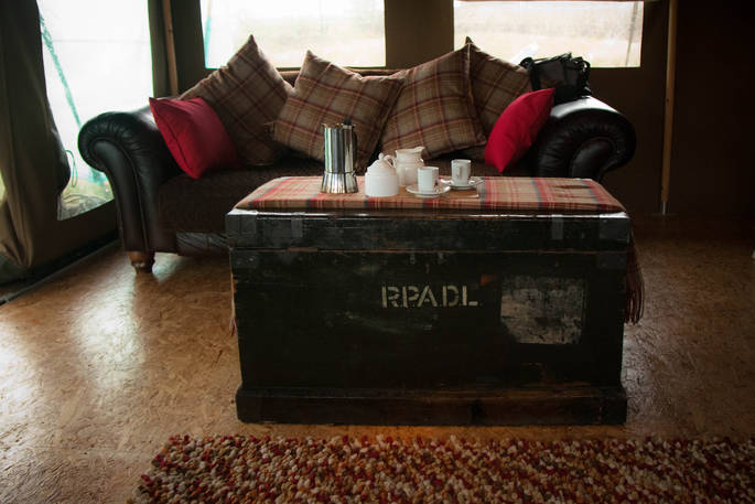 Have a hot drink and relax on the sofa inside Taw at Welcome Meadow in Devon