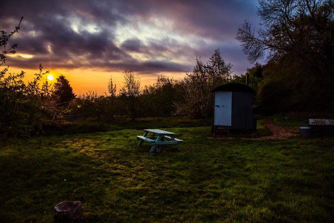 Old Orchard Shepherd's Hut sunset, West Town Farm, Exeter, Devon