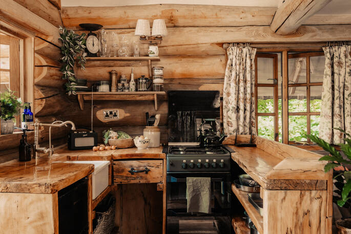 Kitchen equipped with an oven, four ring gas cooker , kettle and cooking utensils