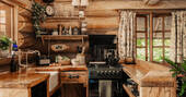 Kitchen equipped with an oven, four ring gas cooker , kettle and cooking utensils