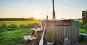 Heat up the hot tub and enjoy a soak whilst watching the sun set at The Happy Hare in Dorset