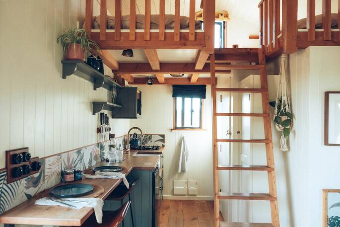 6 - Kitchen and two single beds up on the mezzanine