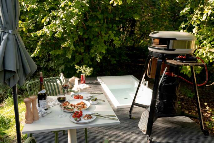 Outdoor dining area and pizza oven