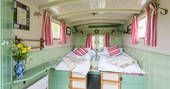 Interior of living van at Camping Coach, made up as two comfortable single beds, Dorset