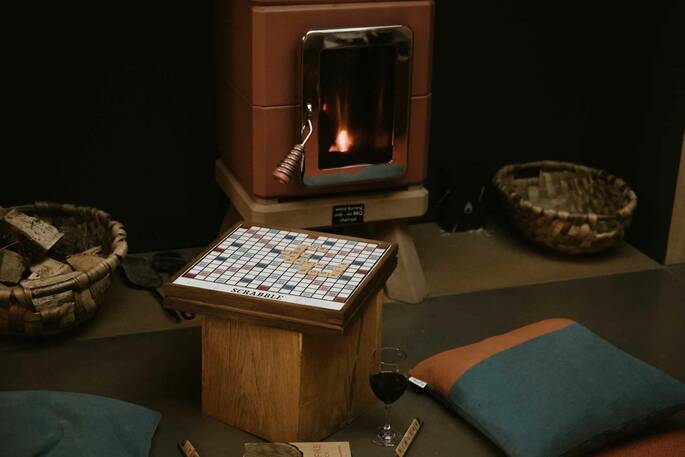 10 - sit by the wood burner play board games