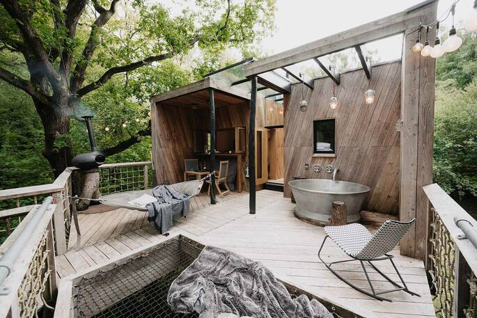 11 - Front decking with a hot tub, hammock and firepit