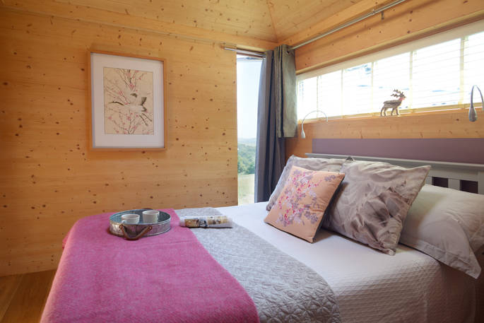 Red Kite cabin bedroom at Red Kite Lodge in Shaftesbury, Dorset