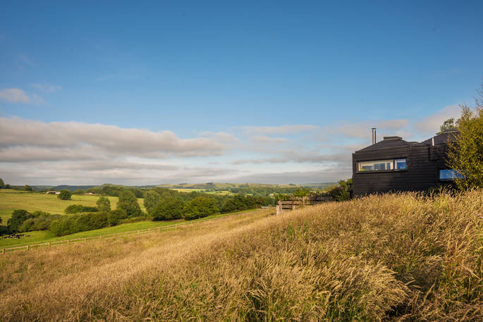 Red Kite cabin exterior with view at Red Kite Lodge in Shaftesbury, Dorset
