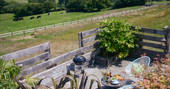 Red Kite cabin outdoor decking area at Red Kite Lodge in Shaftesbury, Dorset