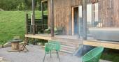 Silent Owl cabin porch and outside area with firepit, Red Kite Lodge at Shaftesbury, Dorset