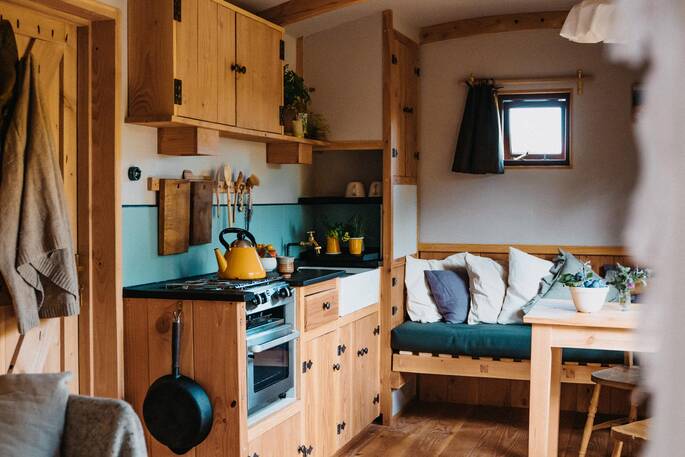 Kitchenette equipped with an oven two ring hob and cooking utensils