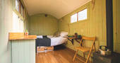 Interior of Tay's Shepherds Hut at Campwell Cherry Orchard in Gloucestershire