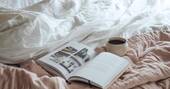 Sit in bed and read with a cup of coffee
