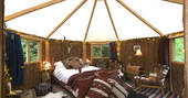 Comfortable and cosy interior of Gold Rush Cabin at Westley Farm in Gloucestershire