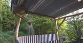 Enjoy an outdoor bathing experience and the watering can outdoor shower at Gold Rush Cabin in Gloucestershire