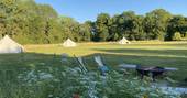 Munday's Meadow group camp glamping firepit and bell tents, Donnington, Gloucestershire