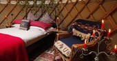 Cosy and rustic interiors of Birch yurt at Adhurst, Hampshire