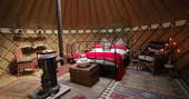 Cosy interiors of Birch yurt at Adhurst, Hampshire
