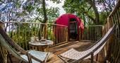 goji tree tent woodland treehouse brook house woods herefordshire england uk glamping decking with views of the malvern hills