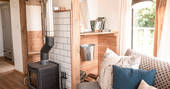 Cosy up by the log burner at Venn Treehouse in Herefordshire