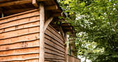 The beautiful wood-cladded exterior of Venn Treehouse in Herefordshire
