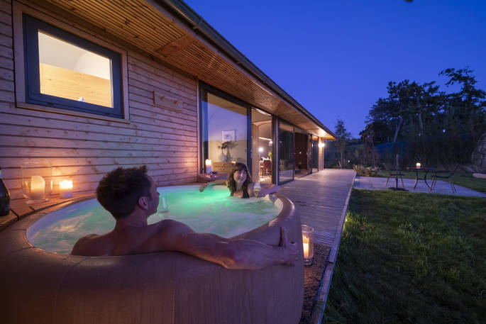 Rowan Cabin hot tub at night, Clifford, Hereford, Herefordshire - photo by Alex Treadway
