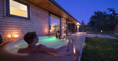Rowan Cabin hot tub at night, Clifford, Hereford, Herefordshire - photo by Alex Treadway