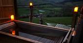 Pen-y-Fan cabin hot tub at night, Garway, Herefordshire, England