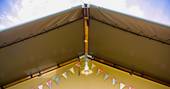 Pretty bunting at Drover's Rest safari tents, Herefordshire