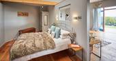 corner house pencombestone cosy cabin interior king size bed