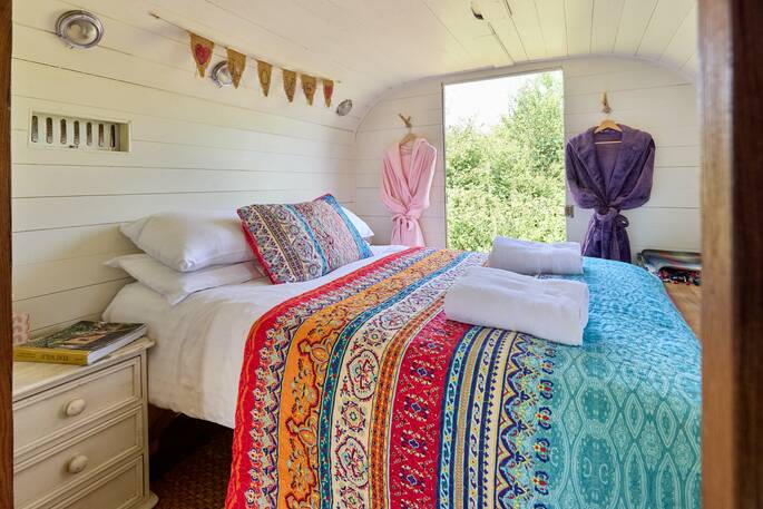 Double bedroom with bed linen, towels and bath robes provided