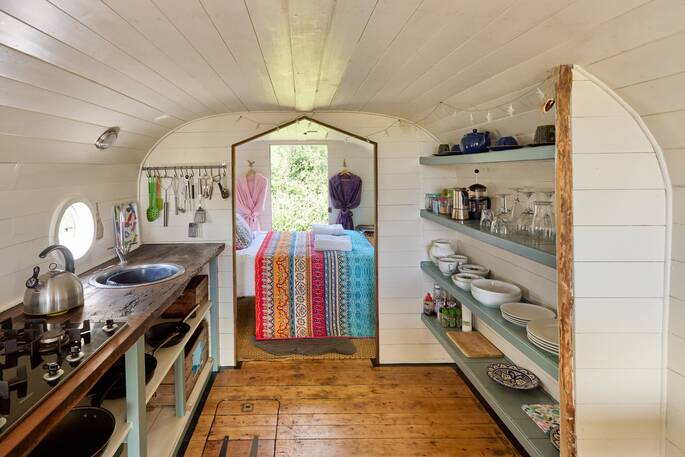 Open plan kitchen leading into the bedroom