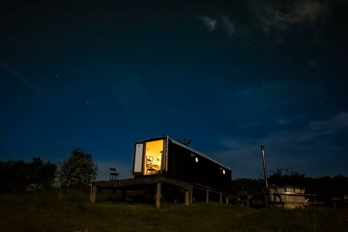 Stargazing wagon at night showing clear skies