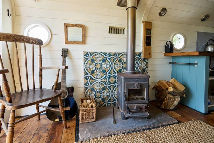 Wood burner as the main source of heat. Initial firewood supplied