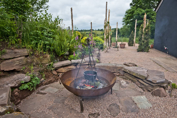 The Nook cabin fire pit at Kaya at Blackhill Farm, Craswall, Herefordshire