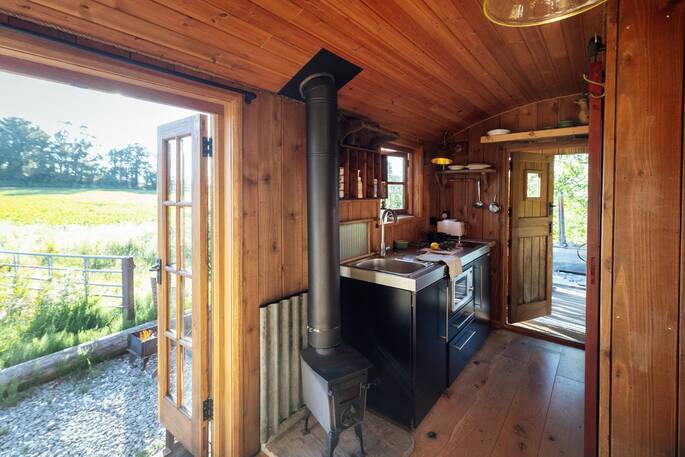 5 Woodburner and view from hut